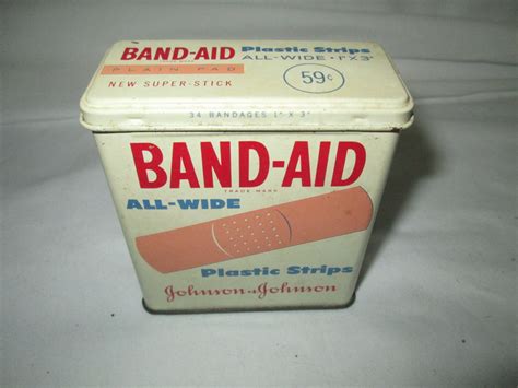 metal band aid box|old tin band aid box.